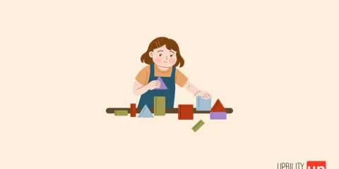 Une jeune fille joue avec des blocs colorés. Un outil pour un test autisme adolescent gratuit.