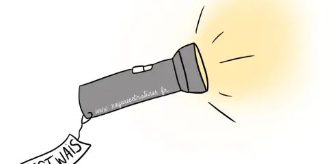 Lampe torche illuminant un test hpi hétérogène, avec une étiquette "TEST WAIS" accrochée.