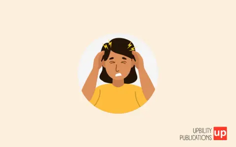 Une personne se tient la tête, le visage crispé, symbolisant un cerveau hypersensible et une amygdale suractive.