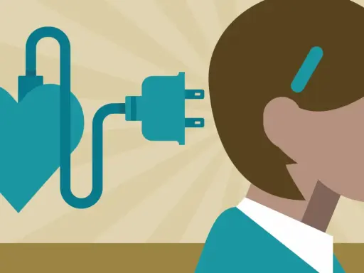 Un cœur bleu relié par un câble à une prise électrique près de la tête d'une personne. Un test HPE pour l'énergie vitale.