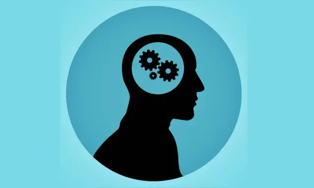 Silhouette d'une tête avec des engrenages à l'intérieur, symbolisant le fonctionnement de la pensée et le test mémoire de travail.